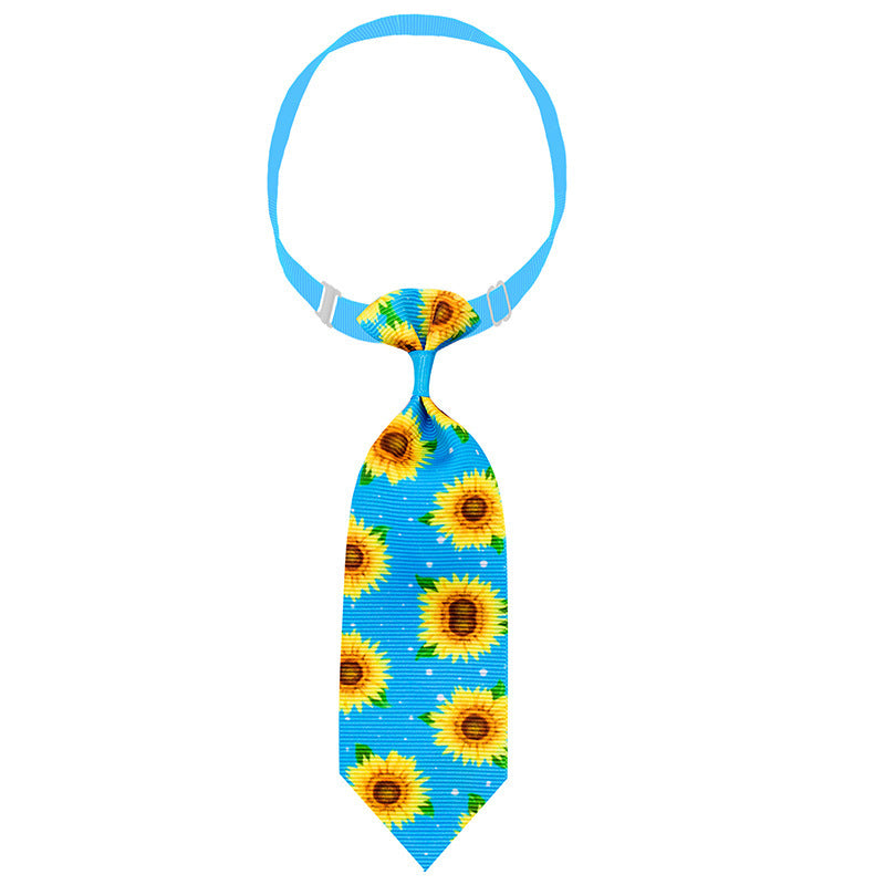 Cravate pour animal de compagnie colorée avec design de tournesols, parfaite pour l'été.