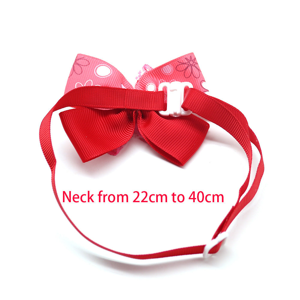 Nœud papillon rose pour chiens et chats avec taille ajustable de 22 à 40 cm, idéal pour accessoires d'animaux.
