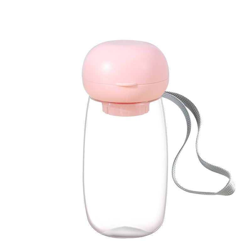 Gourde portable pour animaux de compagnie avec lanière, idéale pour hydratation en plein air.