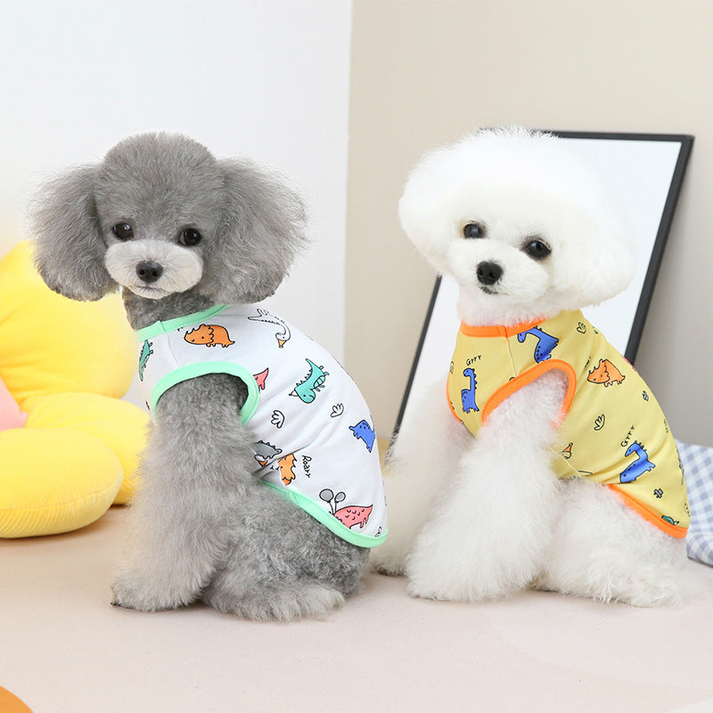 Charming poodles in spring/summer pet clothing, featuring colorful designs in yellow and white, showcasing animal fashion.