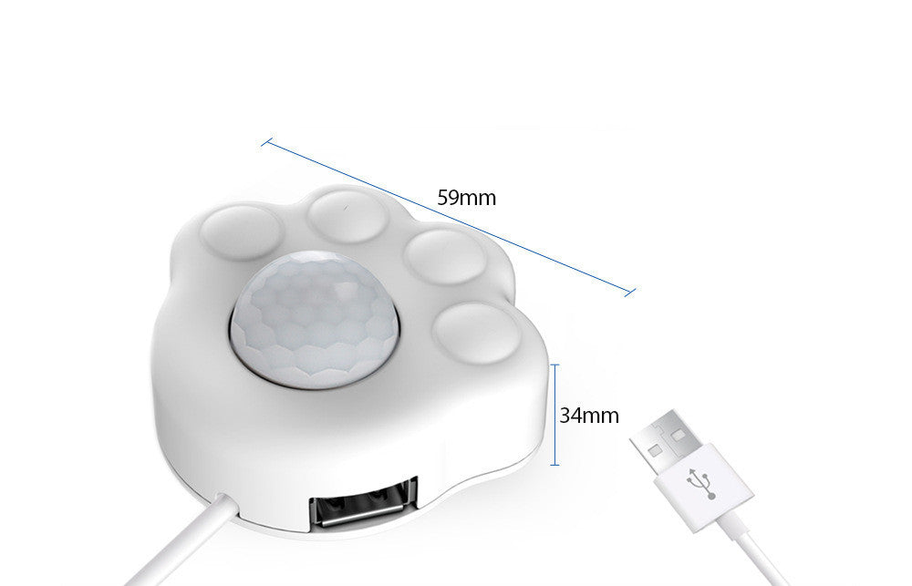 Distributeur d'eau pour animaux avec capteur infrarouge intelligent, format compact avec connecteur USB.