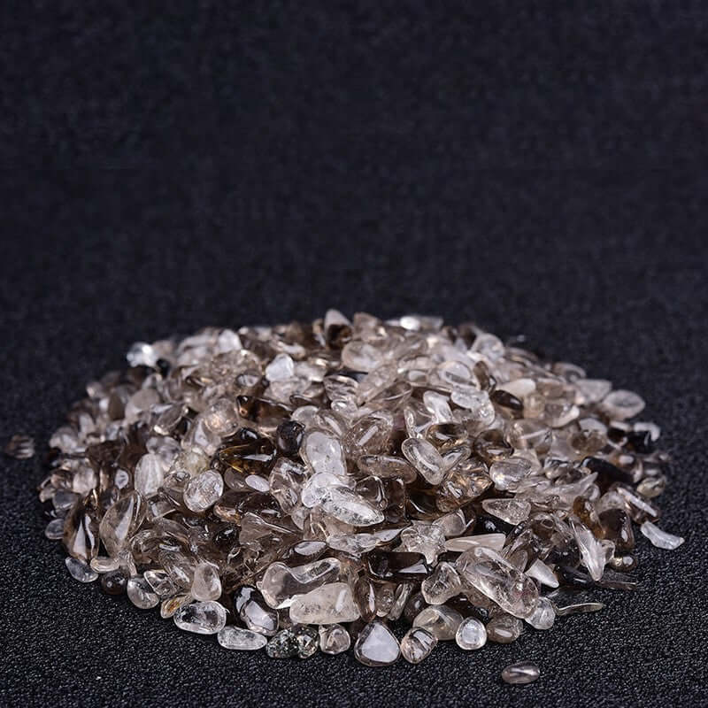 Gravier décoratif en cristal pour aquarium, pierres naturelles élégantes, ajoutant modernité à votre espace aquatique.