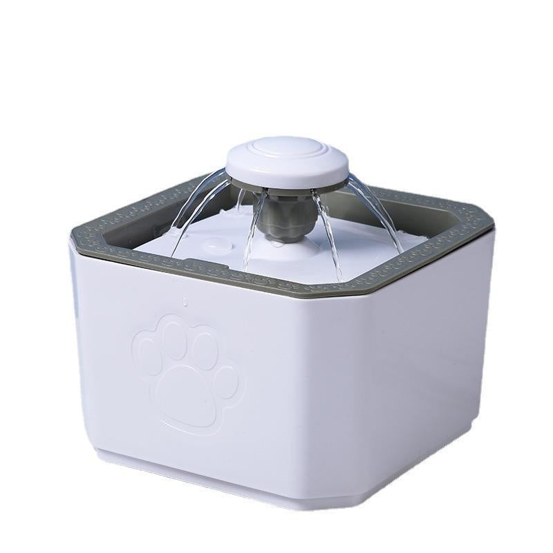 Distributeur d'eau pour chats et chiens avec fontaine, design élégant et élégant en blanc.