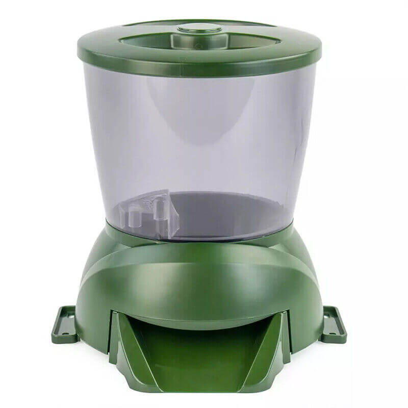 Distributeur automatique de nourriture pour poissons de jardin, matériel en ABS, couleur verte, taille compacte.
