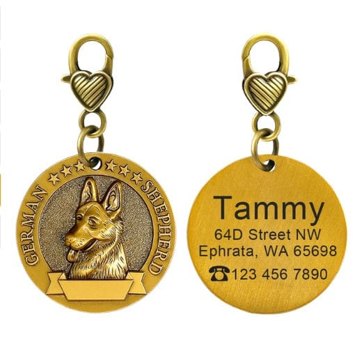 Porte-identité personnalisé en bronze pour chien avec le nom et les coordonnées sur le verso.