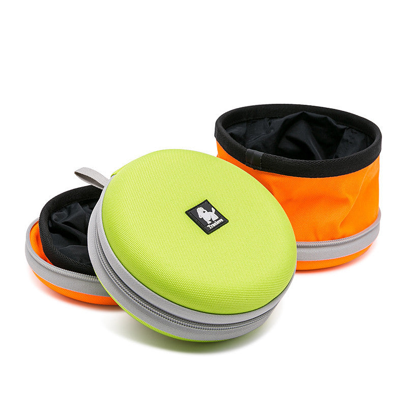 Bol pliable orange et vert pour chiens, idéal pour les voyages et les sorties en plein air.