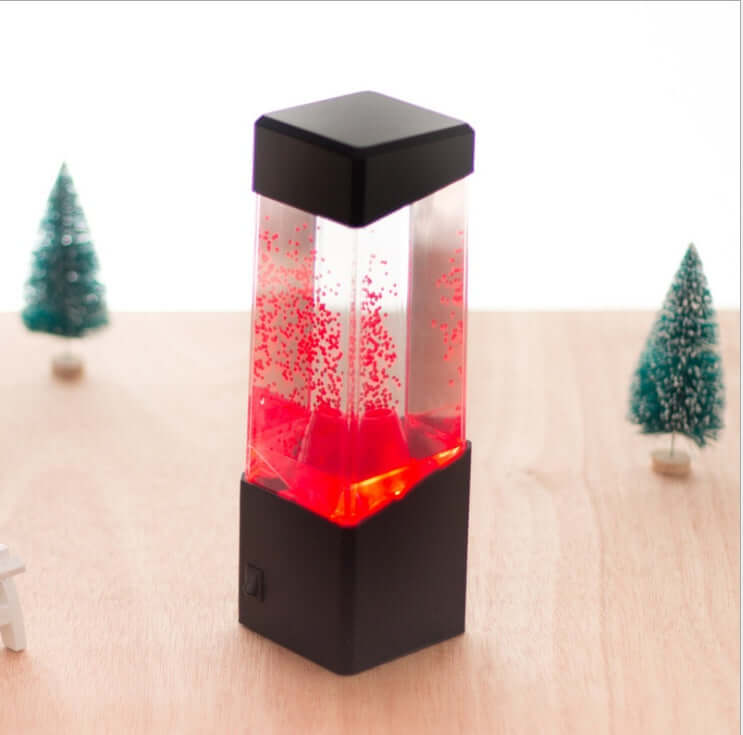 Veilleuse Jellyfish LED colorée avec effet d'éruption volcanique, idéale pour une ambiance apaisante.