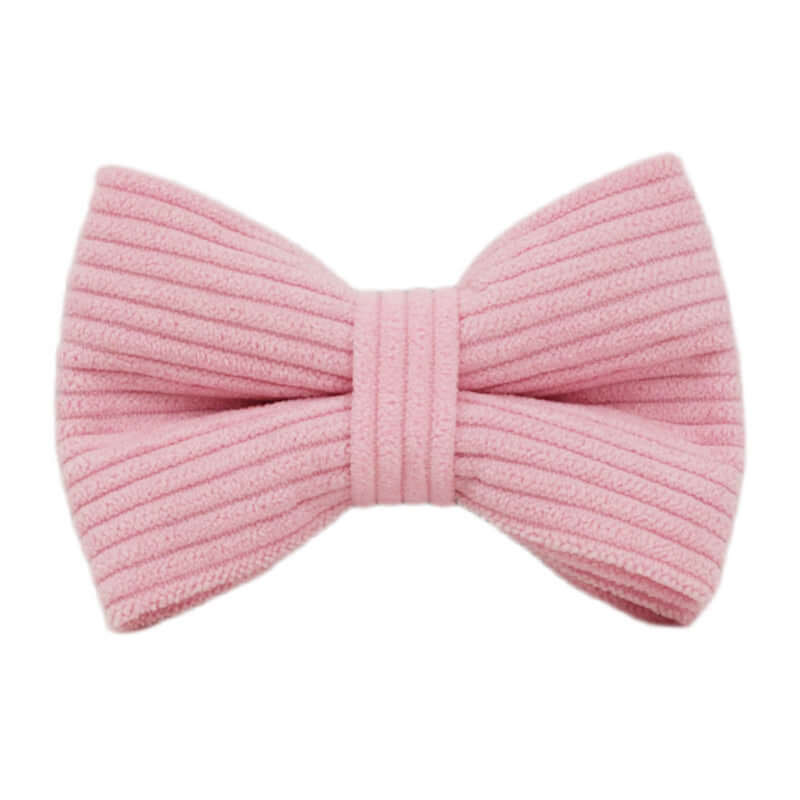 Pink ribbed bow tie accessory for pets, stylish and playful addition to your dog's wardrobe.