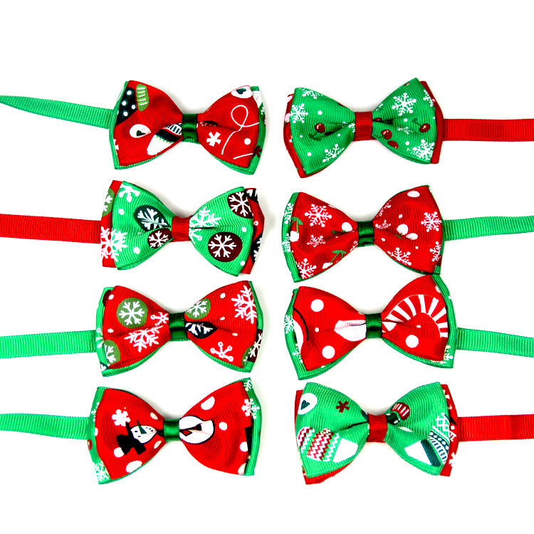 Assorted Christmas bow ties for dogs and cats in red and green, featuring festive patterns and adjustable straps.