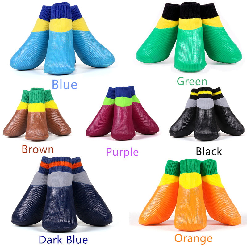 Assorted colorful socks in blue, green, brown, purple, black, dark blue, and orange, displayed in pairs.