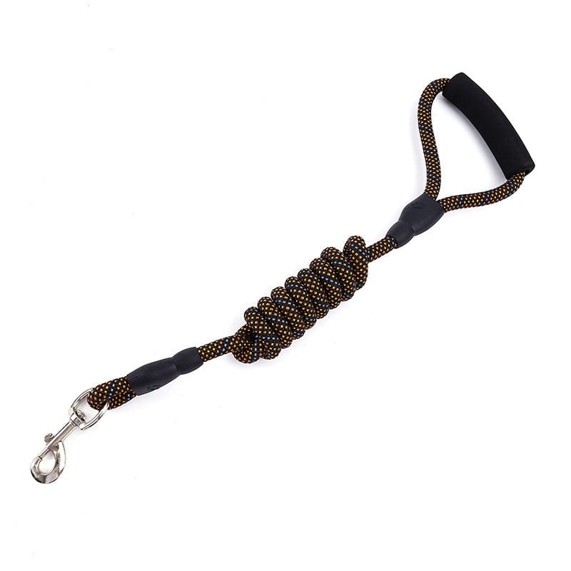 Corde de traction pour chien en nylon doré avec manche ergonomique pour un contrôle optimal lors des promenades.