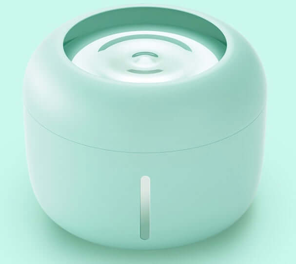 Distributeur d'eau pour animaux, design moderne en vert menthe, pratique pour hydrater chiens et chats.