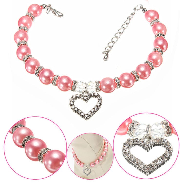 Collier en perles roses pour animaux avec pendentif en forme de cœur en argent, élégant et confortable.