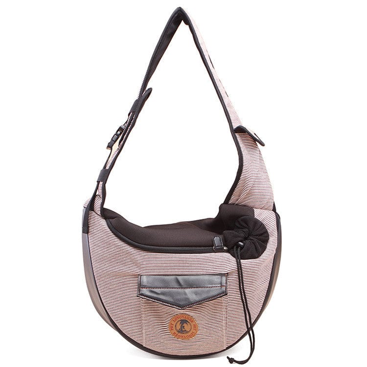 Sac de voyage chic en coton rayé pour animaux, idéal pour le confort des animaux lors des déplacements.