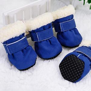 Bottes d'hiver imperméables pour chiens, conçues pour petites races, couleur bleue avec intérieur en fourrure.