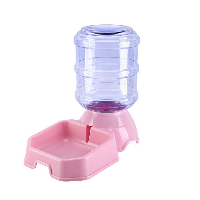 Fontaine à eau automatique pour chat en plastique rose, idéale pour l'hydratation des animaux de compagnie.
