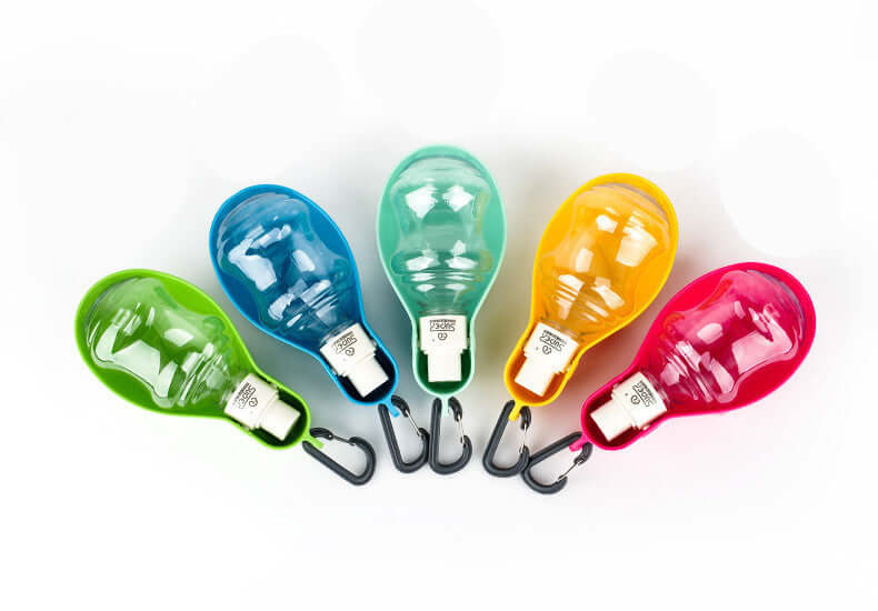 Colorful portable water bottles for dogs and cats, designed for easy access during walks and travels.