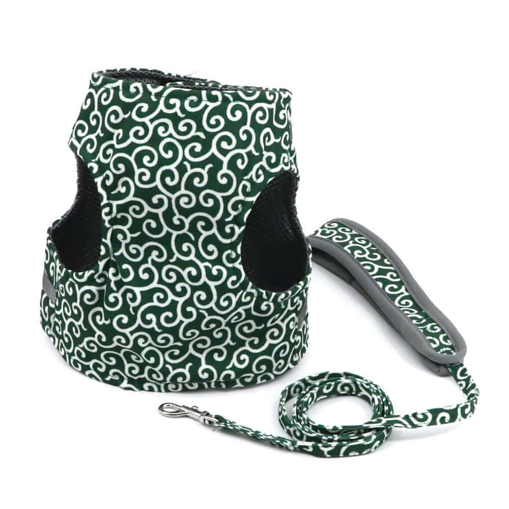 Gilet de traction pour animaux en polyester vert avec motif, idéal pour chiens et chats, accompagnée d'une laisse assortie.