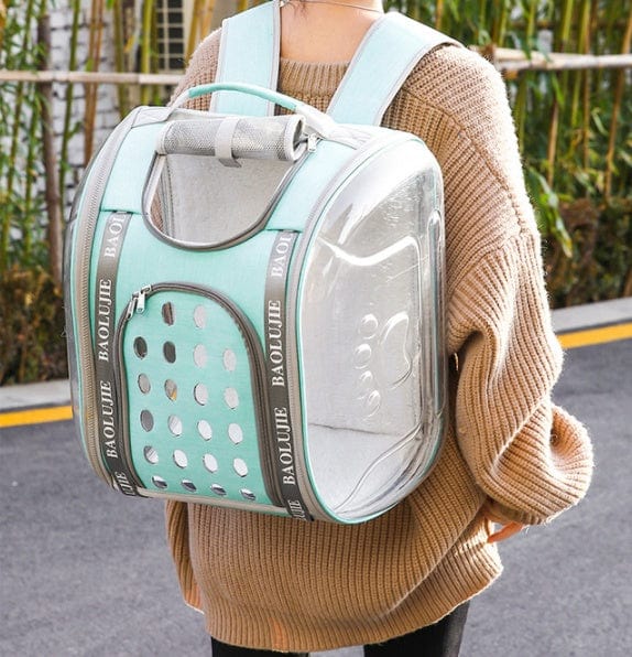 Sac à dos portable pour animaux avec couvercle transparent et design confortable pour chats et chiens.