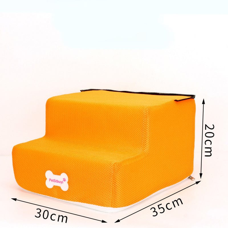 Escalier pour chiens en mousse orange, doux et confortable, facilitant l'accès aux meubles.