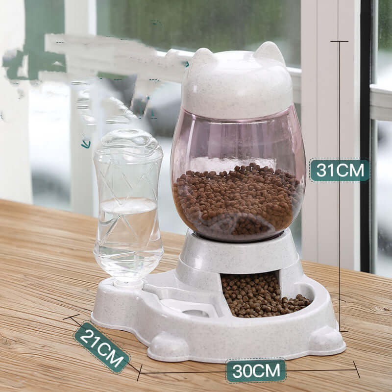 Distributeur automatique de nourriture et d'eau pour chats et chiens, capacité de 2,2L pour nourriture et 528ml pour eau.