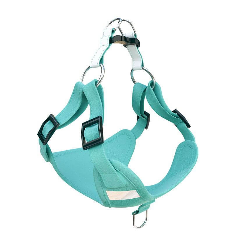 Harnais réfléchissant pour chien en suède, couleur turquoise, offrant confort et sécurité lors des promenades.