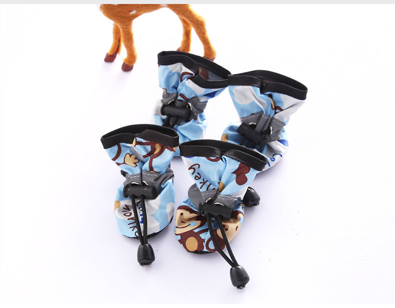 Chaussures pour chiens en tissu respirant, pratiques et confortables, avec motifs amusants, idéales pour la sécurité des pattes.