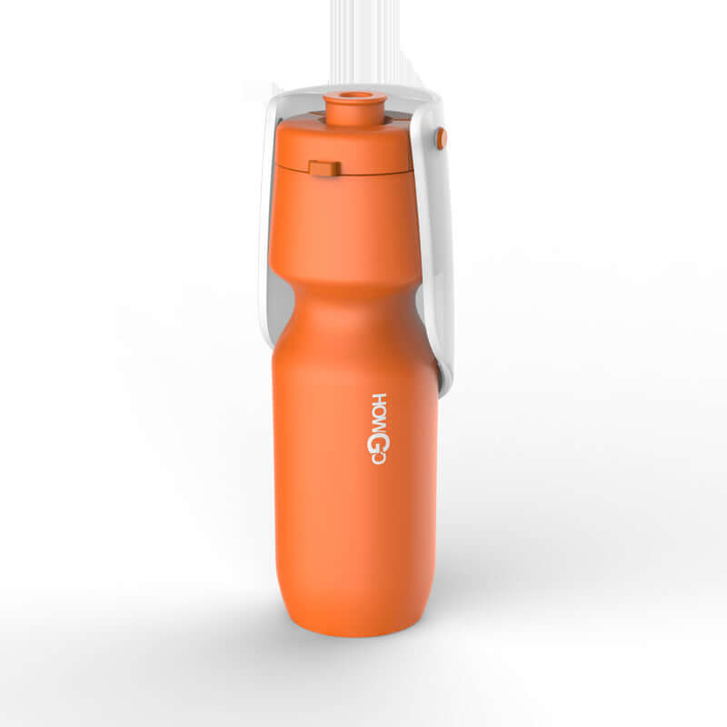 Gourde de voyage pour chiens orange, idéale pour hydrater votre animal lors de balades et excursions.