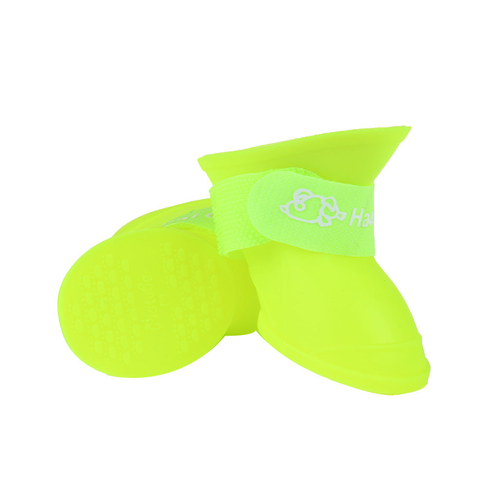Chaussures en silicone douces et étanches pour animaux, couleur jaune fluo, offrant confort et protection.