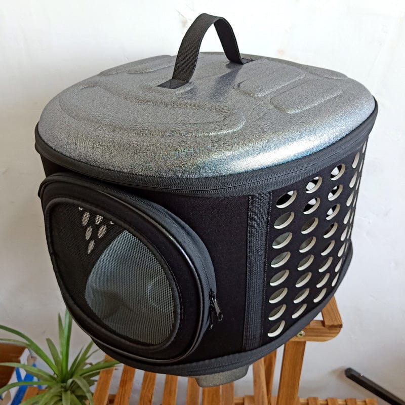Sac de transport pour animaux pliable et portable, idéal pour voyager en toute sécurité avec vos compagnons.