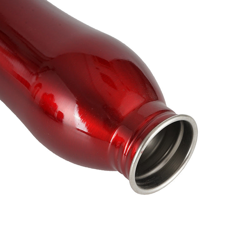 Bouteille d'eau portable rouge pour animaux de compagnie, idéale pour les balades en plein air.