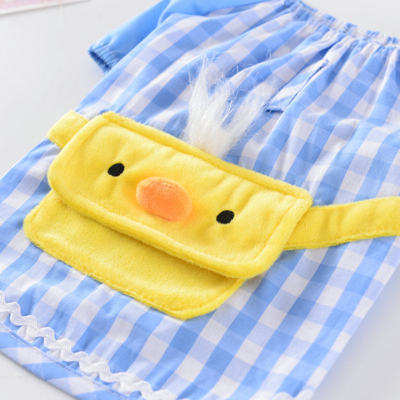 Vêtement pour chien en coton bleu à carreaux avec poche jaune en forme de canard, idéal pour le printemps et l'été.
