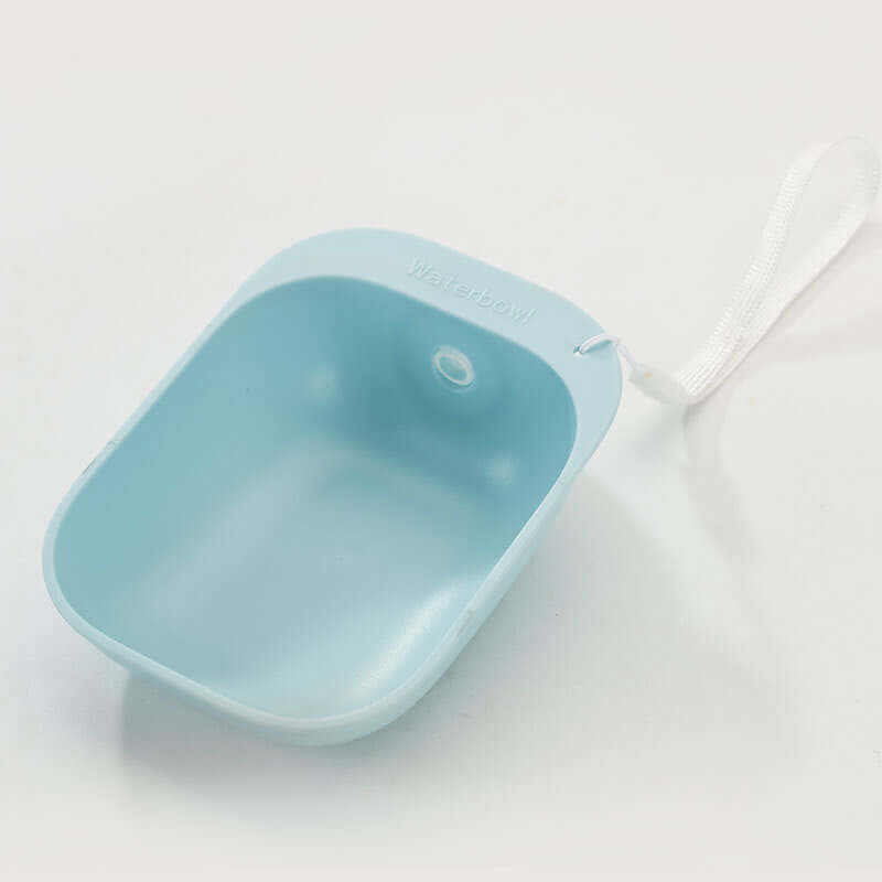 Bouteille d'eau portable Teddy en bleu, idéale pour hydrater vos animaux en déplacement.