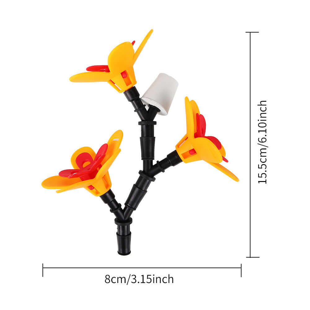 Distributeur de graines en forme de fleurs en plastique coloré pour attirer les oiseaux dans votre jardin.