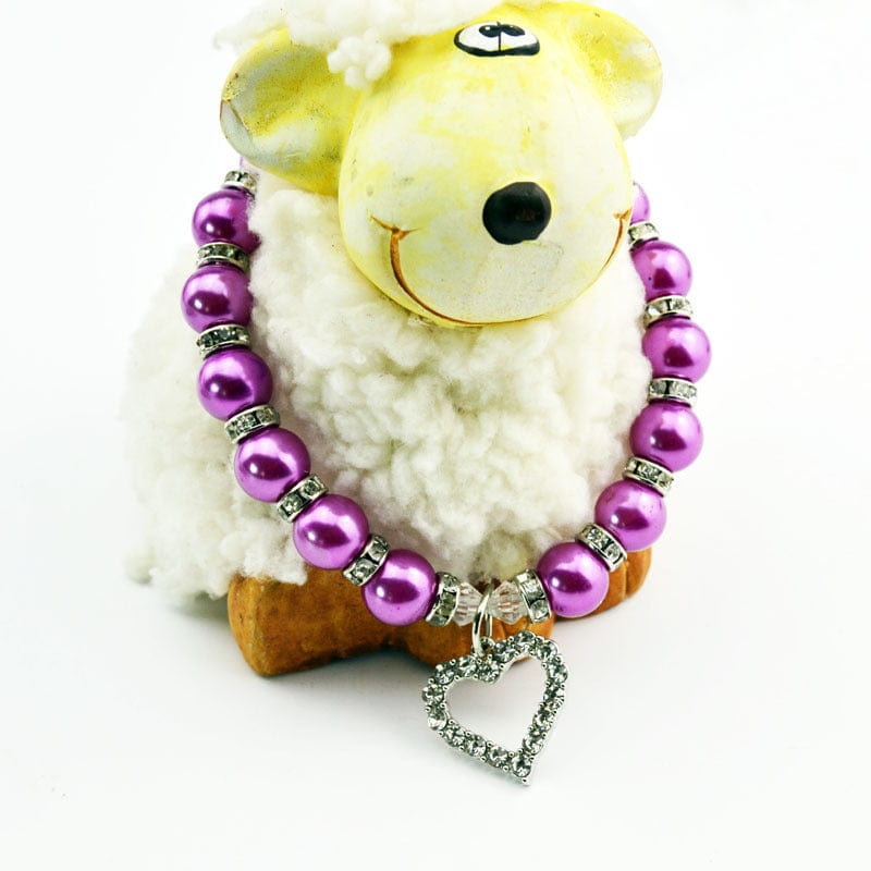 Collier en perles pour animaux de compagnie avec pendentif en forme de cœur, élégant et tendance.