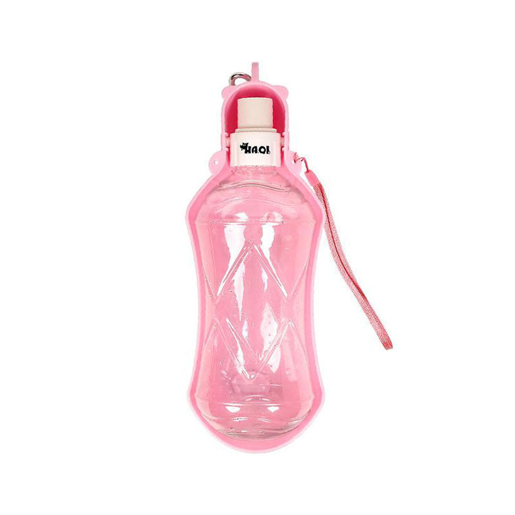 Bouteille d'eau portable rose pour chiens, idéale pour l'hydratation lors de promenades et aventures en plein air.