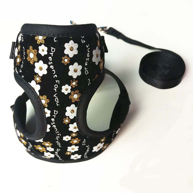 Laisse pour petit chien avec motif floral noir et blanc, idéale pour promenades sécurisées.