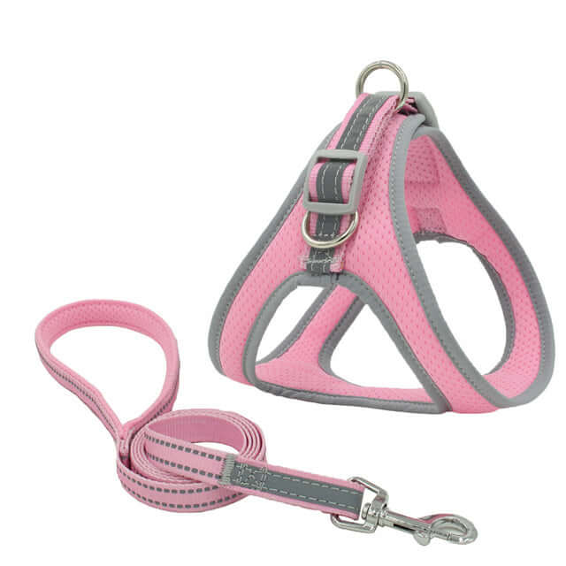 Harnais de poitrine rose pour animaux avec laisse assortie, conçu pour le confort et la sécurité des chiens.
