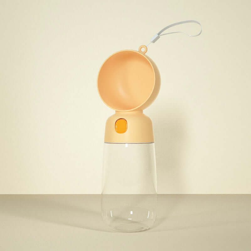 Gourde portable pour chien en plastique, idéale pour l'hydratation lors des sorties avec votre animal.