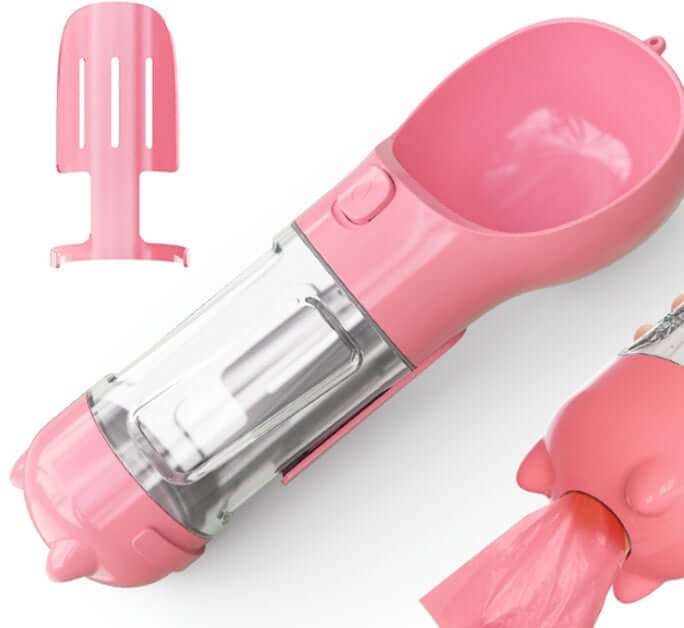 Bouteille d'eau multifonctionnelle pour animaux avec distributeur de sacs en rose.