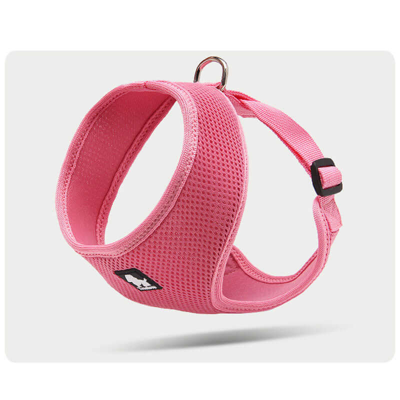 Harnais de sécurité rose pour petits chiens, léger et confortable, parfait pour les promenades.