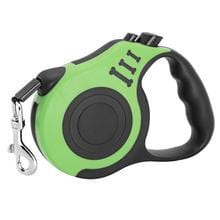 Laisse télescopique automatique verte pour chiens avec système de freinage et de verrouillage à une main.