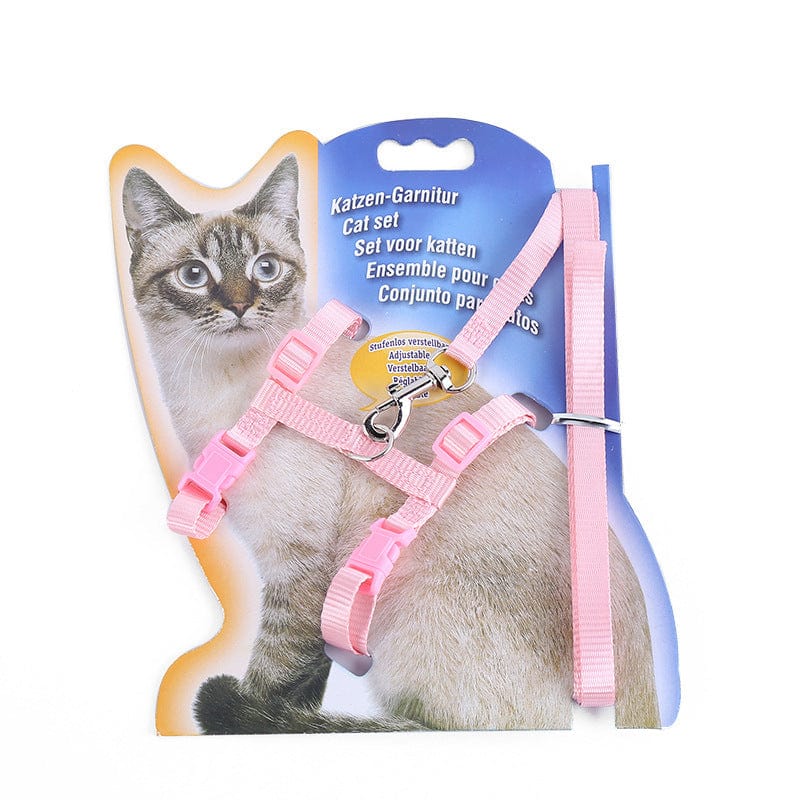 Harnais en nylon pour chats en rose avec laisse sur emballage illustré.