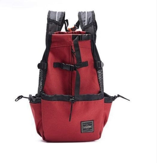 Sac à dos ventilé et respirant pour animaux, en rouge, avec des bretelles réglables et des poches pratiques.