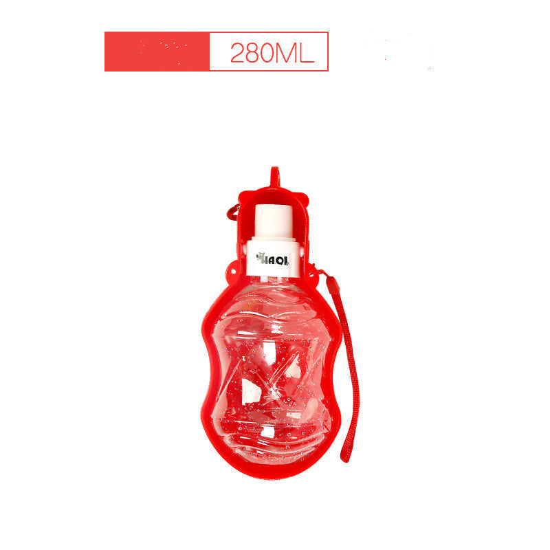 Bouteille d'eau portable rouge de 280ml pour chiens, idéale pour les aventures en plein air.