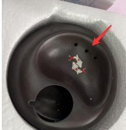 Fontaine à eau automatique pour chats avec motif de poissons rouges, conçue pour l'hydratation des animaux.