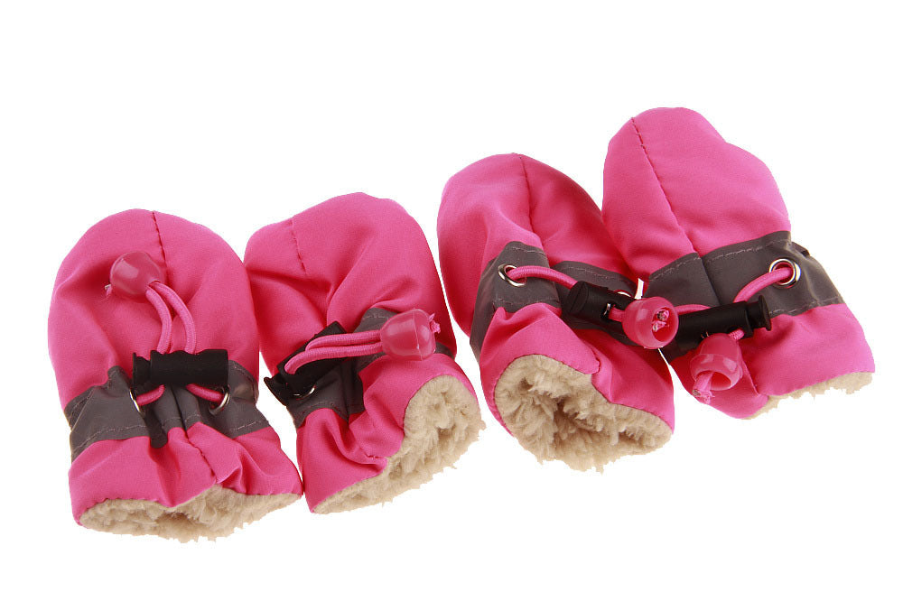 Chaussures pour chiens confortables et durables en rose, parfaites pour protéger les pattes de votre animal.