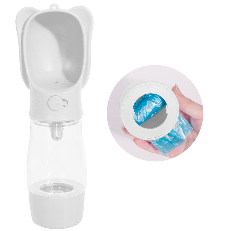 Bol d'eau pour chien avec distributeur de sacs à déjections pratique, design ergonomique et léger.
