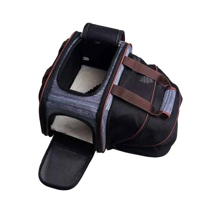 Sac à dos pour chien portable en denim, ouvert, avec zone de confort pour animaux, idéal pour déplacements.