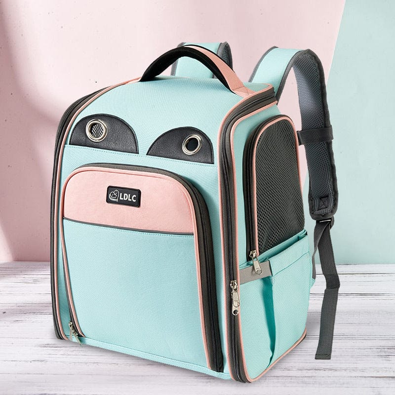 Sac à dos pour animaux portable et élargissable, design moderne en bleu et rose, idéal pour le transport sécurisé.